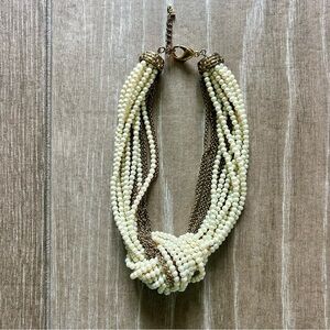 Elegant Pearl and Gold Multi-Strand Necklace